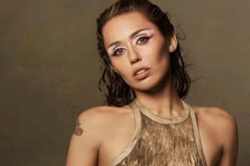 Miley Cyrus posa com maquiagem marcante e expressão séria, foto por Ethan James Green