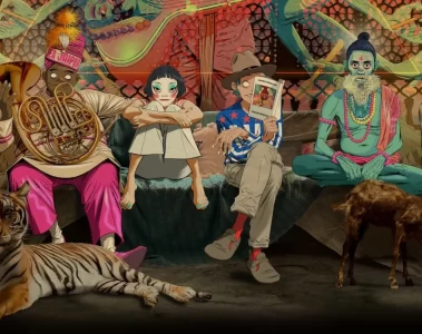 Arte oficial do álbum The Mountain do Gorillaz, com os personagens Murdoc, Noodle, Russel e 2D em cenário inspirado na Índia.