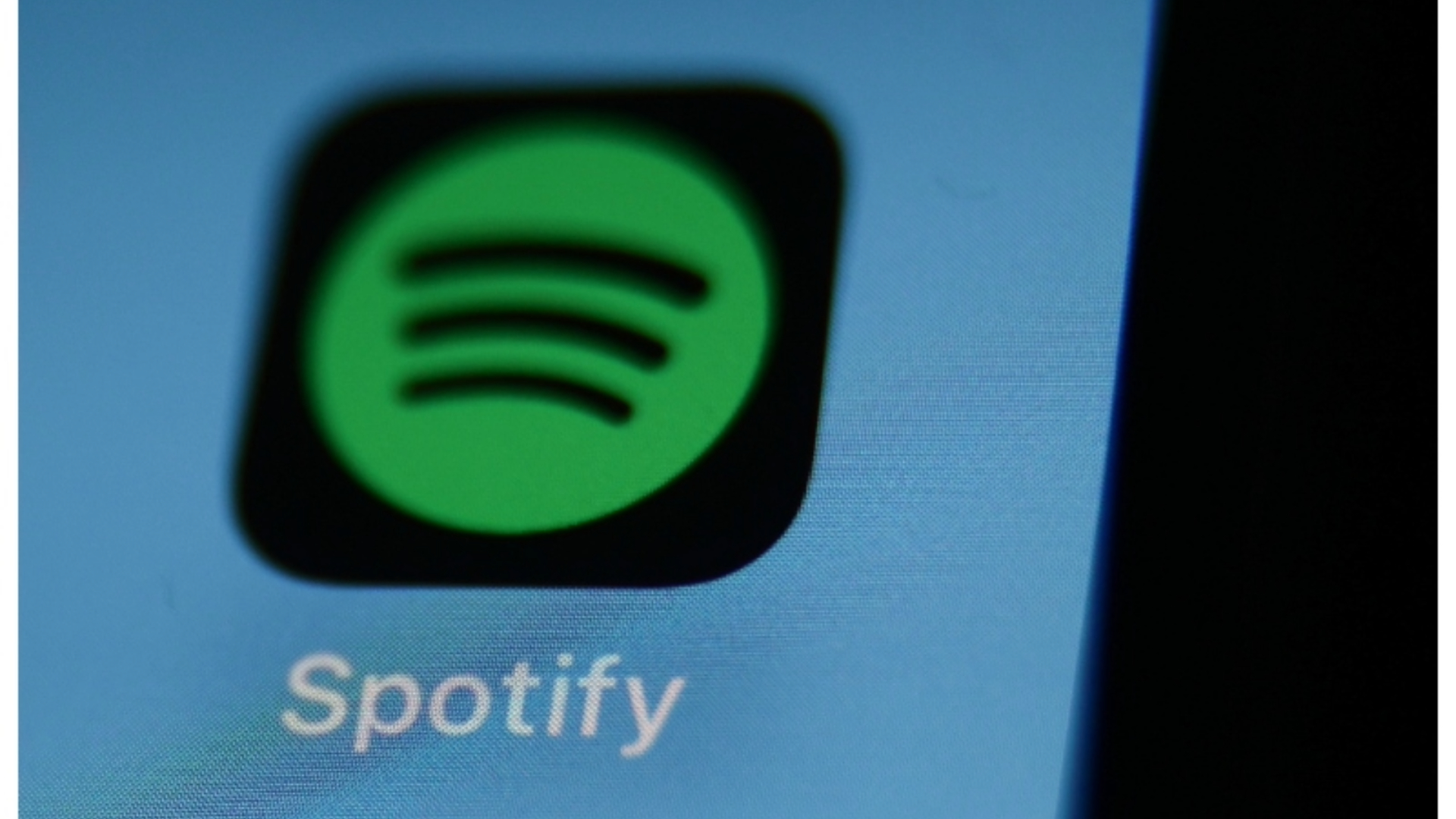 Ícone do aplicativo Spotify em tela de smartphone.