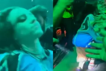 Billie Eilish é puxada por um fã durante show em Miami enquanto cumprimenta o público na turnê Hit Me Hard and Soft.