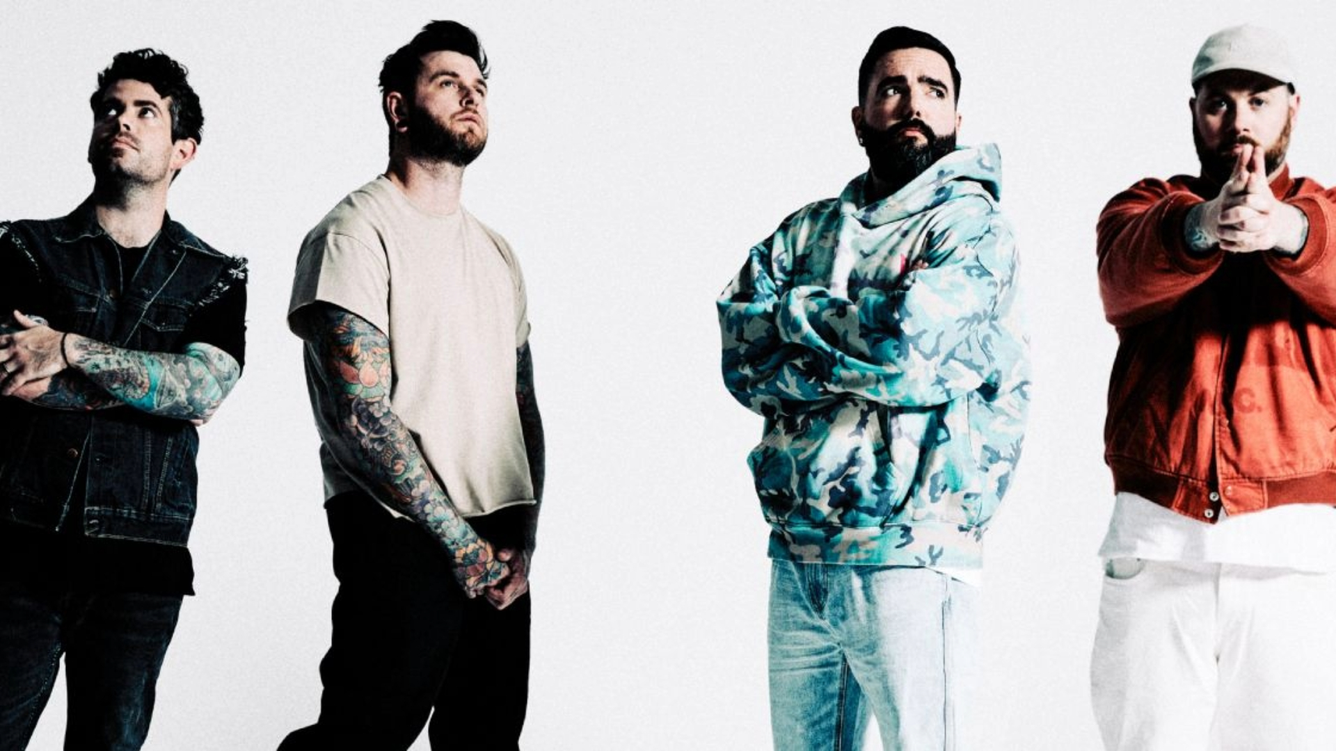 Foto promocional do A Day To Remember com os quatro integrantes posando lado a lado em fundo branco, em divulgação da turnê 2026 no Brasil.