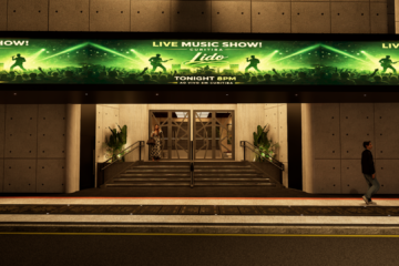 Fachada do novo Cine Lido em Curitiba com iluminação noturna e painel de show ao vivo